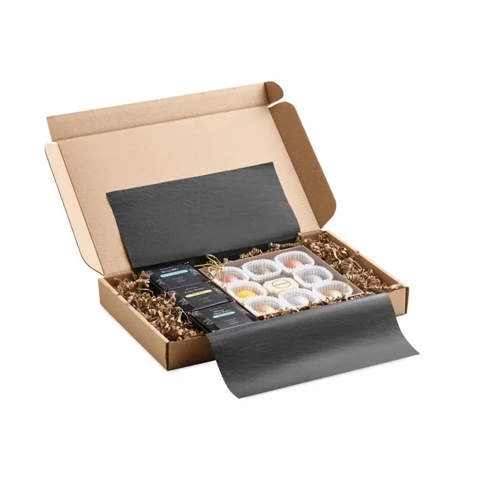 Geschenkdoos met bonbons en thee in verzorgde verpakking als bedankje voor de leraar