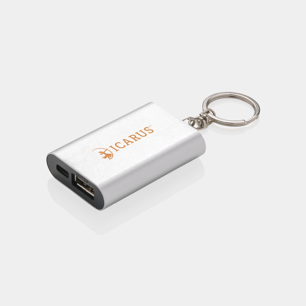 Compacte witte sleutelhanger powerbank met geïntegreerde oplaadkabels als teambuilding relatiegeschenk